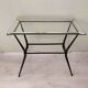 Antique side table in metal and glass