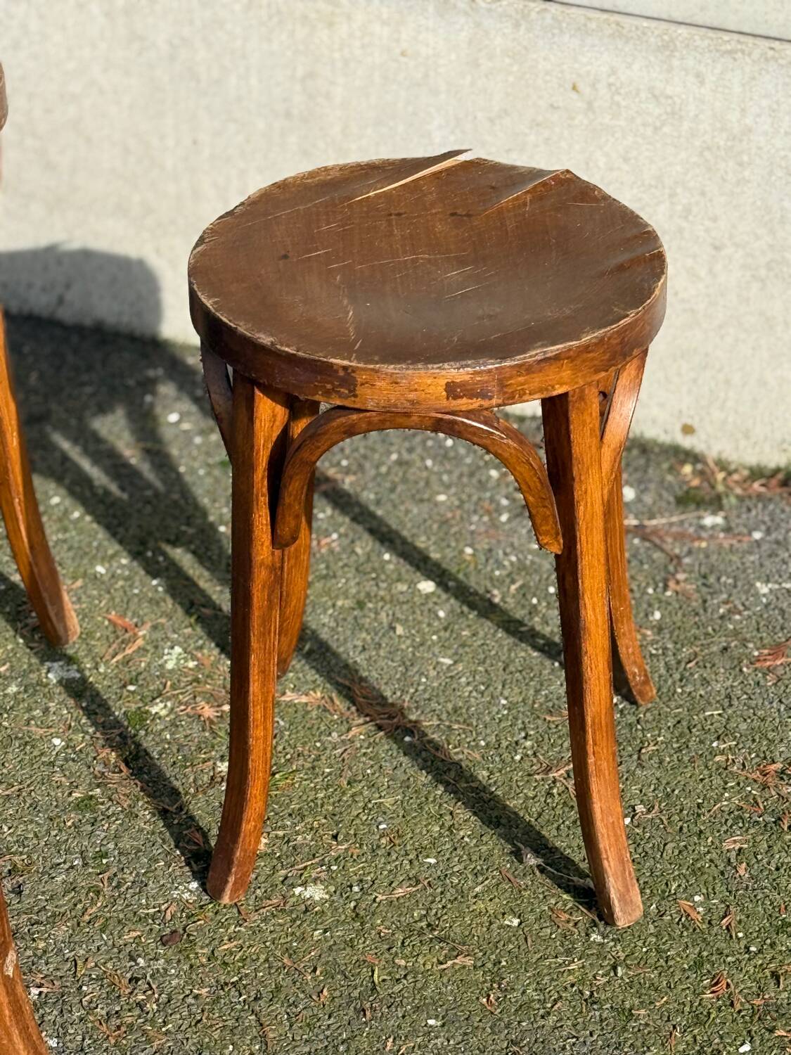 Set of four curved wooden stools stamped Baumann model 92.