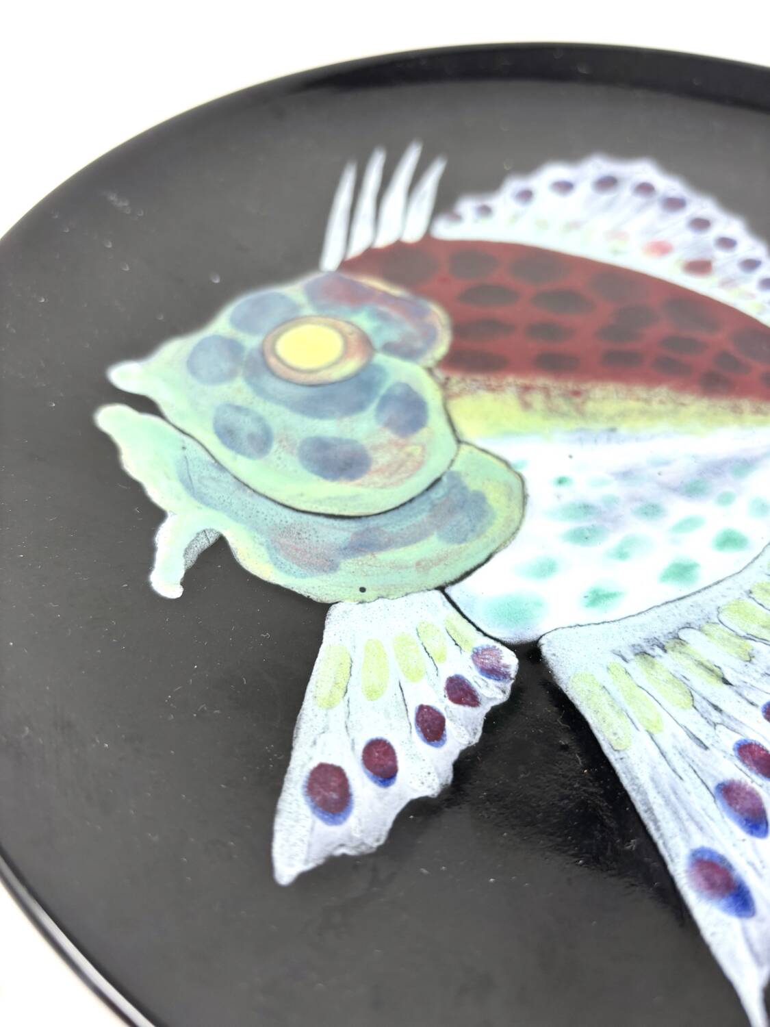 Ceramic plate with fish design from Louvain