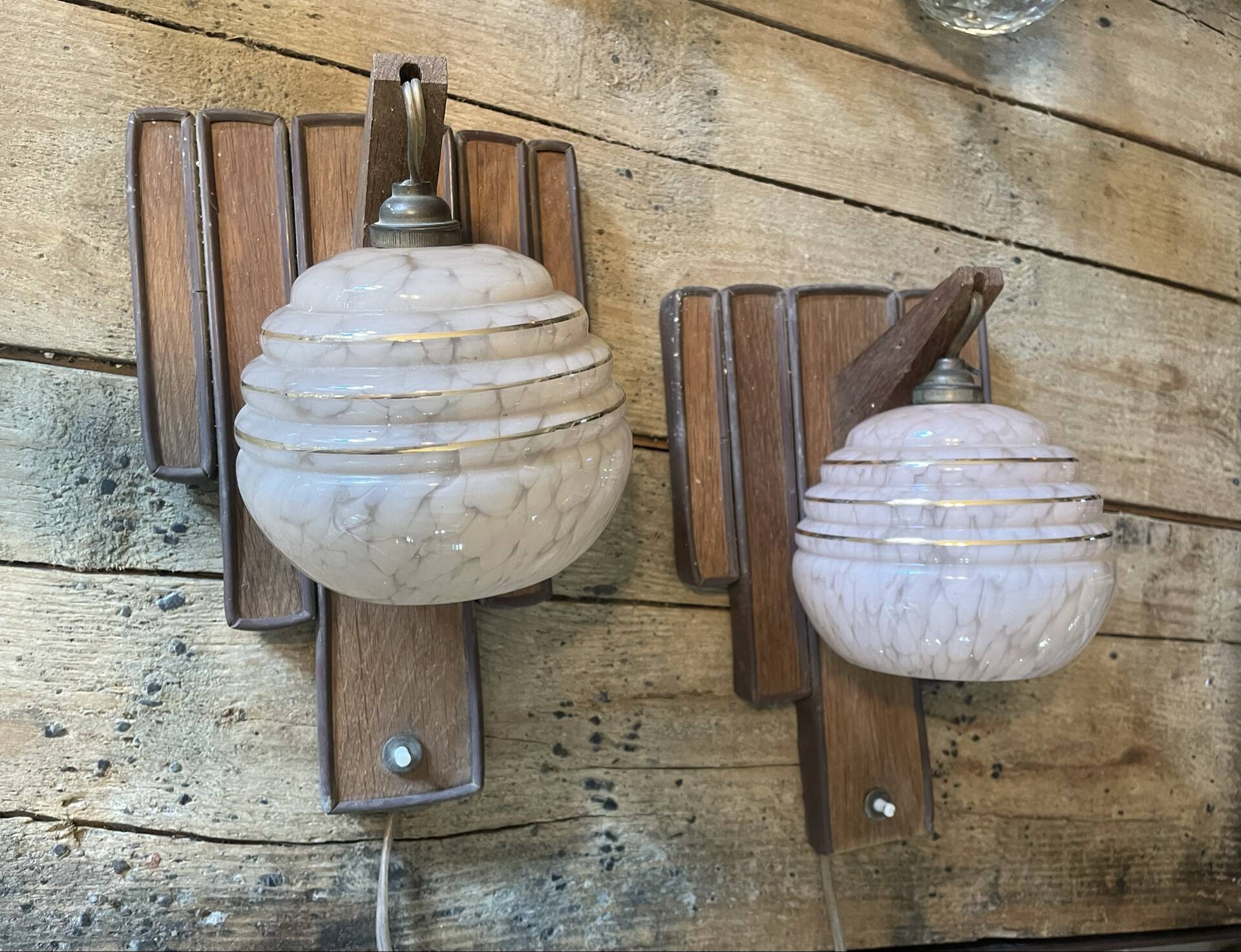 Paire vintage Art Deco wall sconces in pink glass.