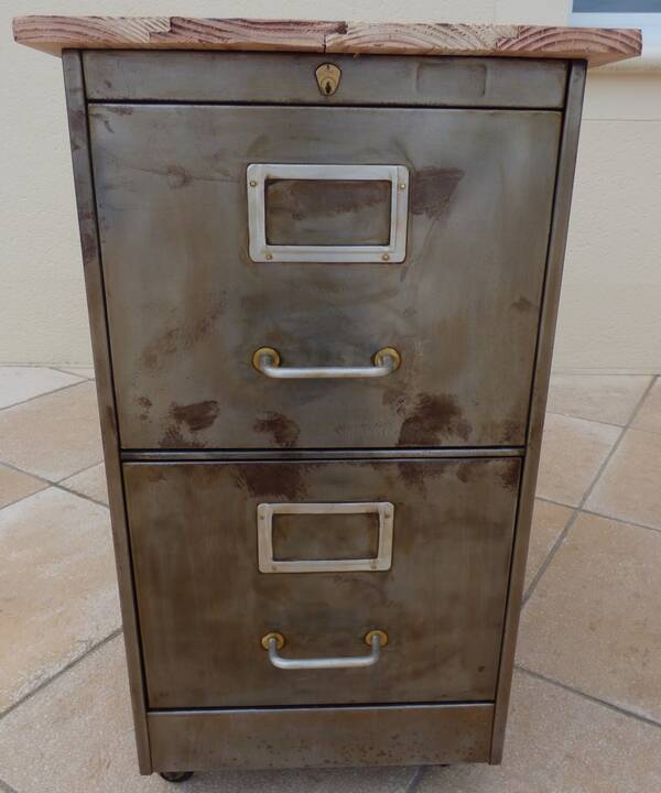 Old industrial furniture in rusty effect metal with two drawers on casters