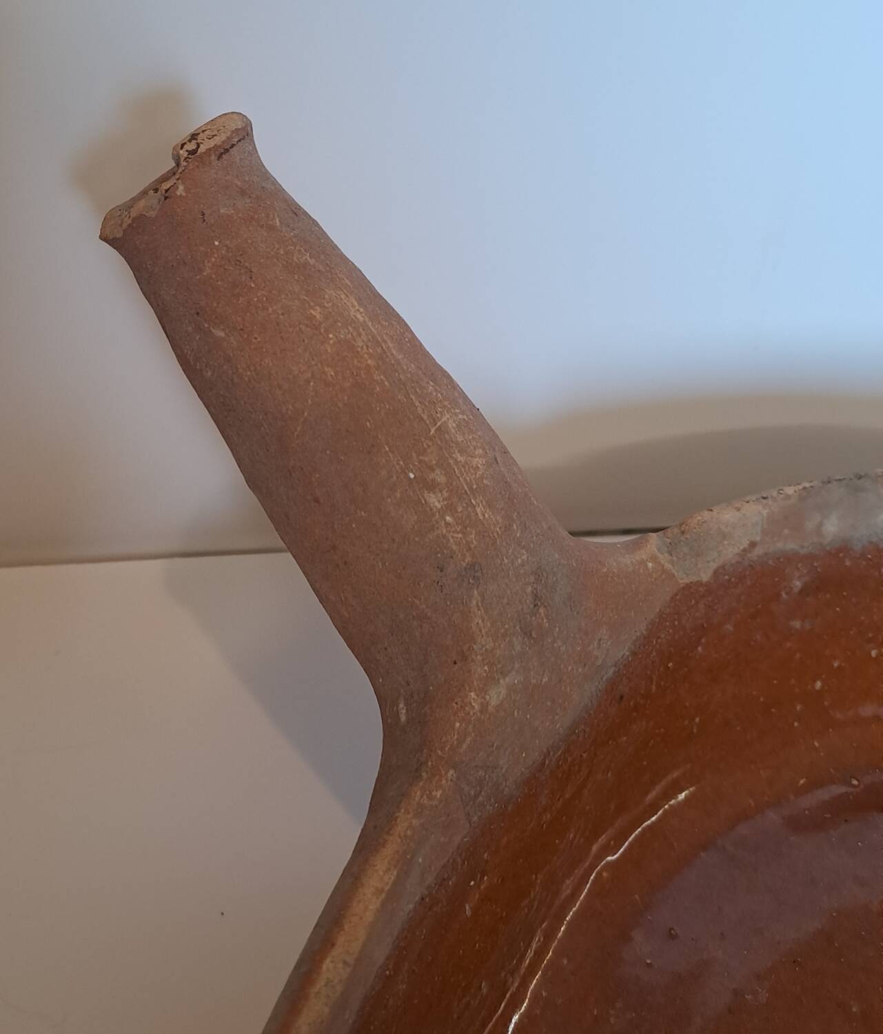 Old glazed terracotta frying pan from the 19th century.