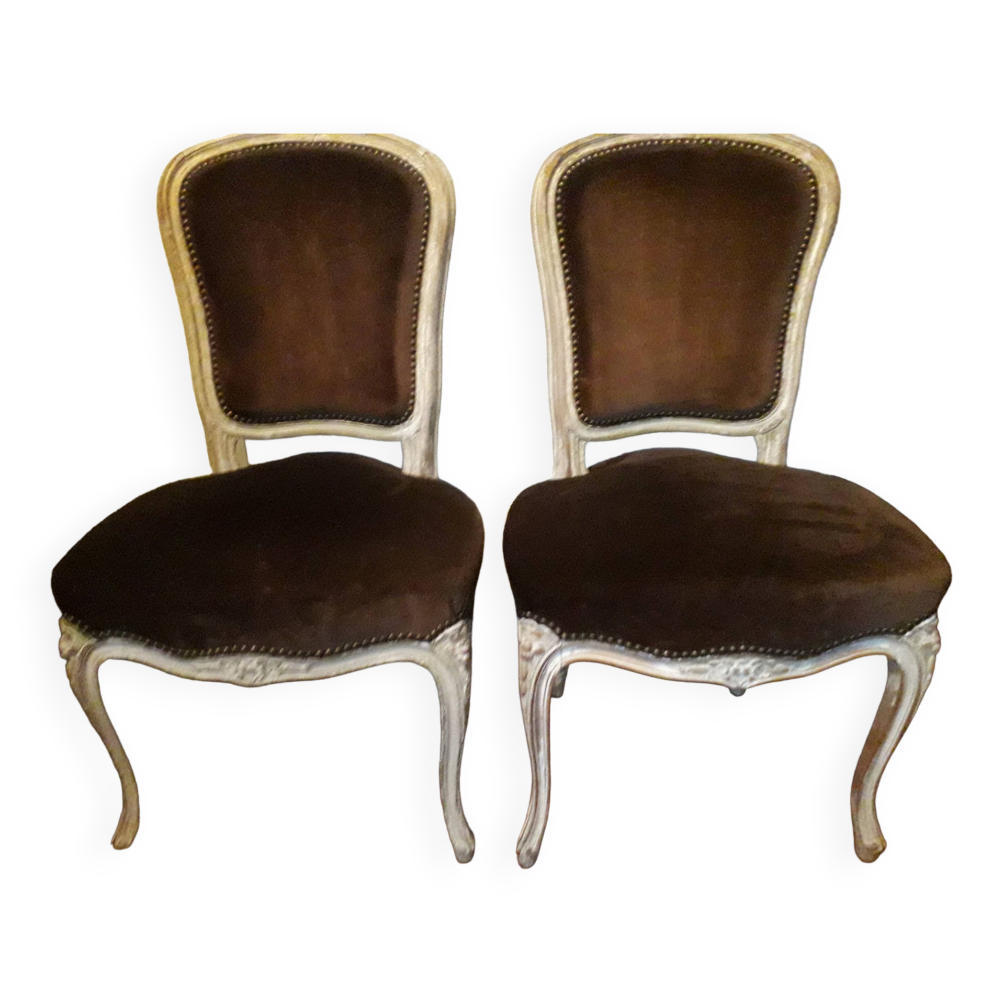 A pair of Louis XV style armchairs