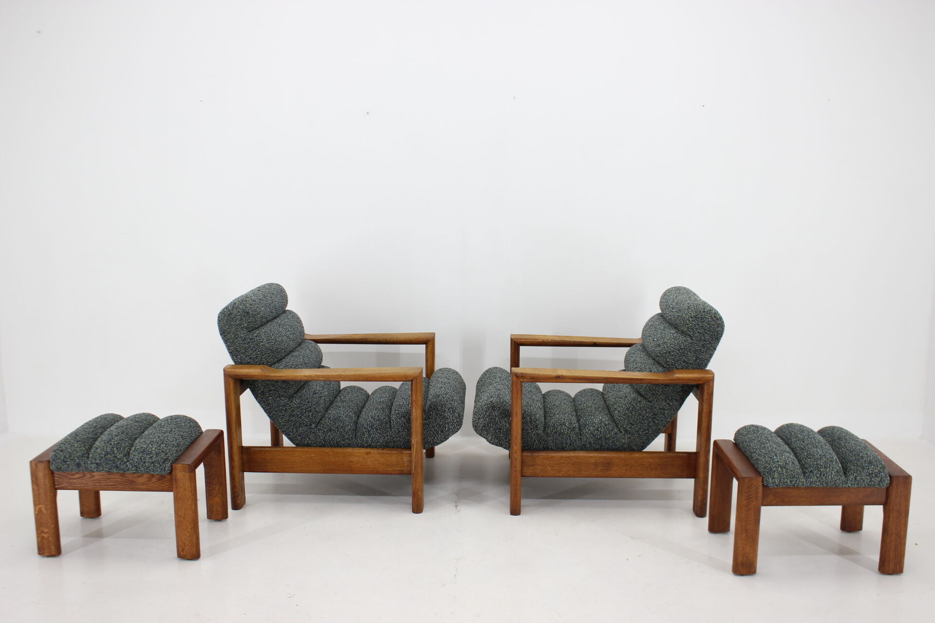 1960s pair of armchairs with stools in oak, Finland