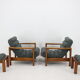 1960s pair of armchairs with stools in oak, Finland