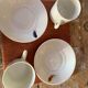 Two monastic porcelain cups