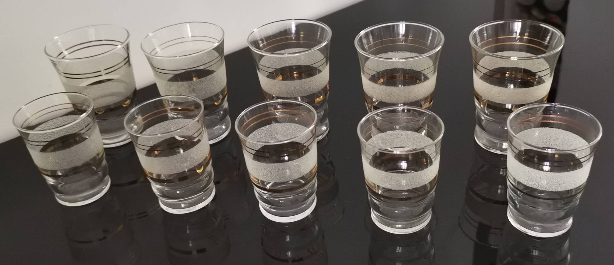 Set of 5 water glasses and 5 aperitif glasses with granite decorations and gold edging from the 1950s