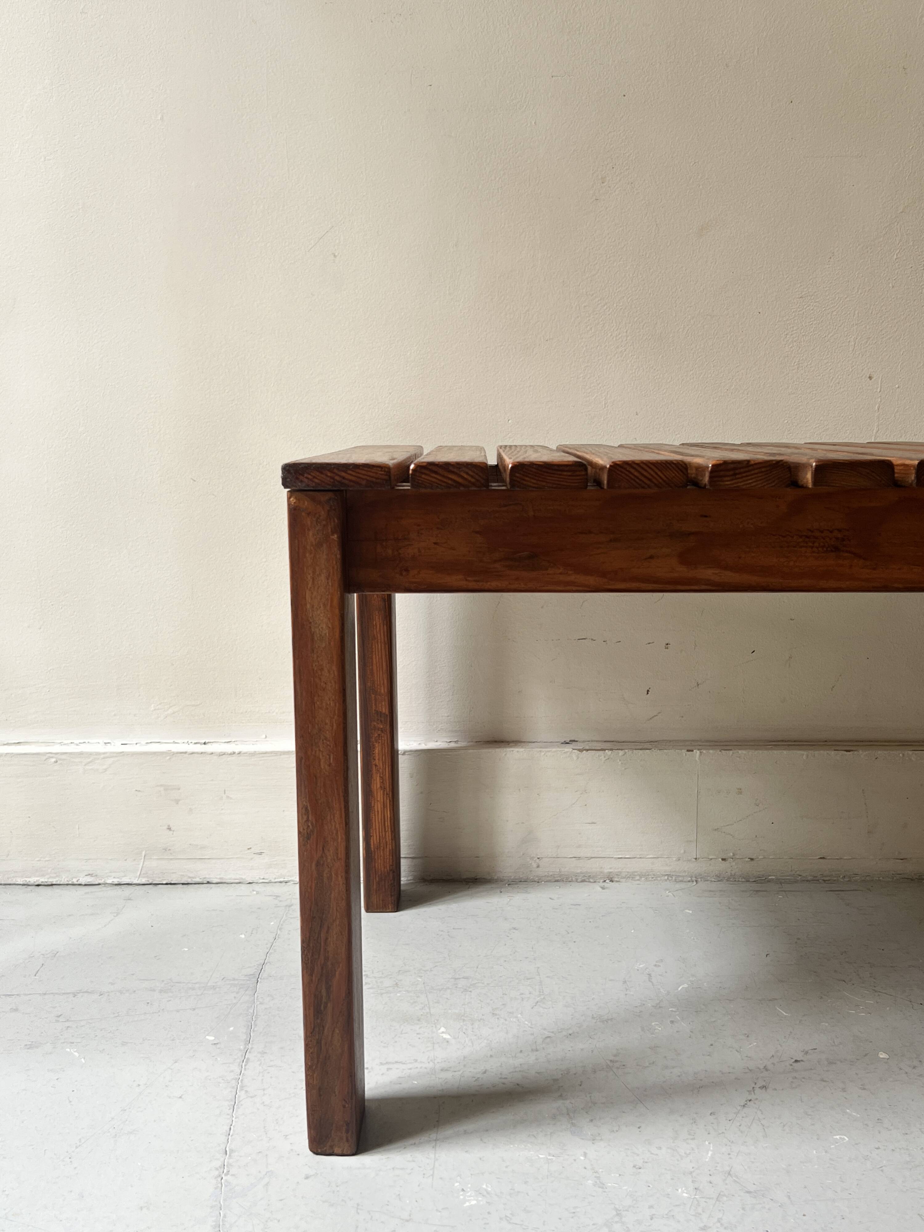 Bench / modernist coffee table made of wooden slats, 1970s design.