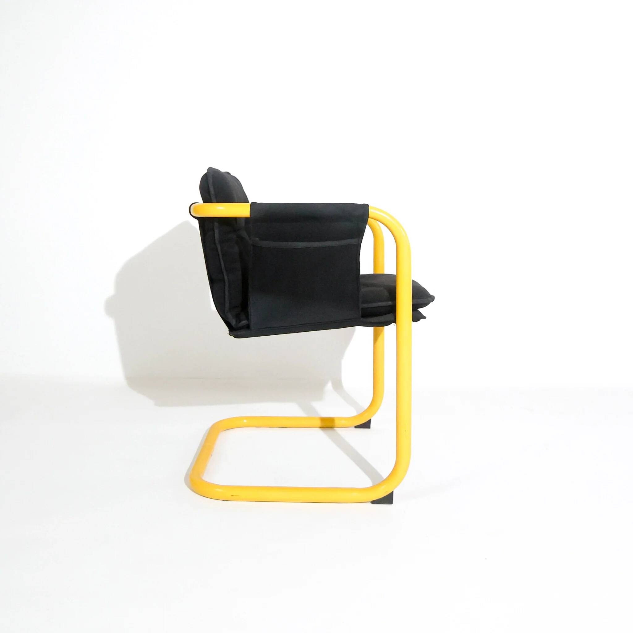 Postmodern cantilever armchair with a yellow tubular frame, Italy, 1970s.