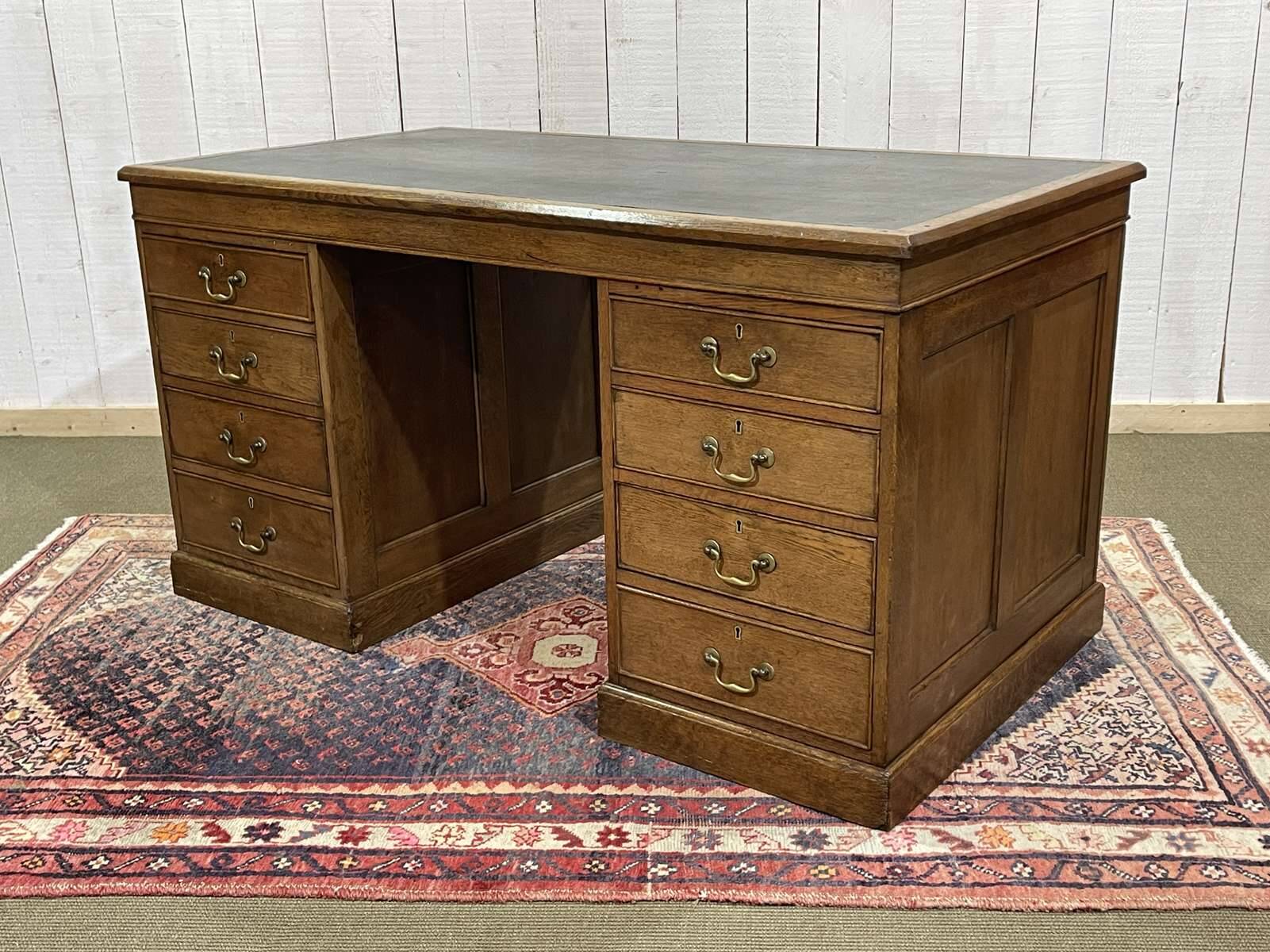 Early 20th century English flat desk in oak