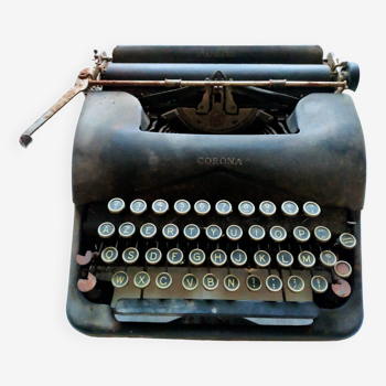 Machine à écrire ancienne marque Corona.