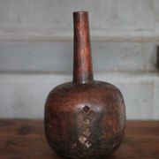 Vintage African wooden carved gourd bottle.