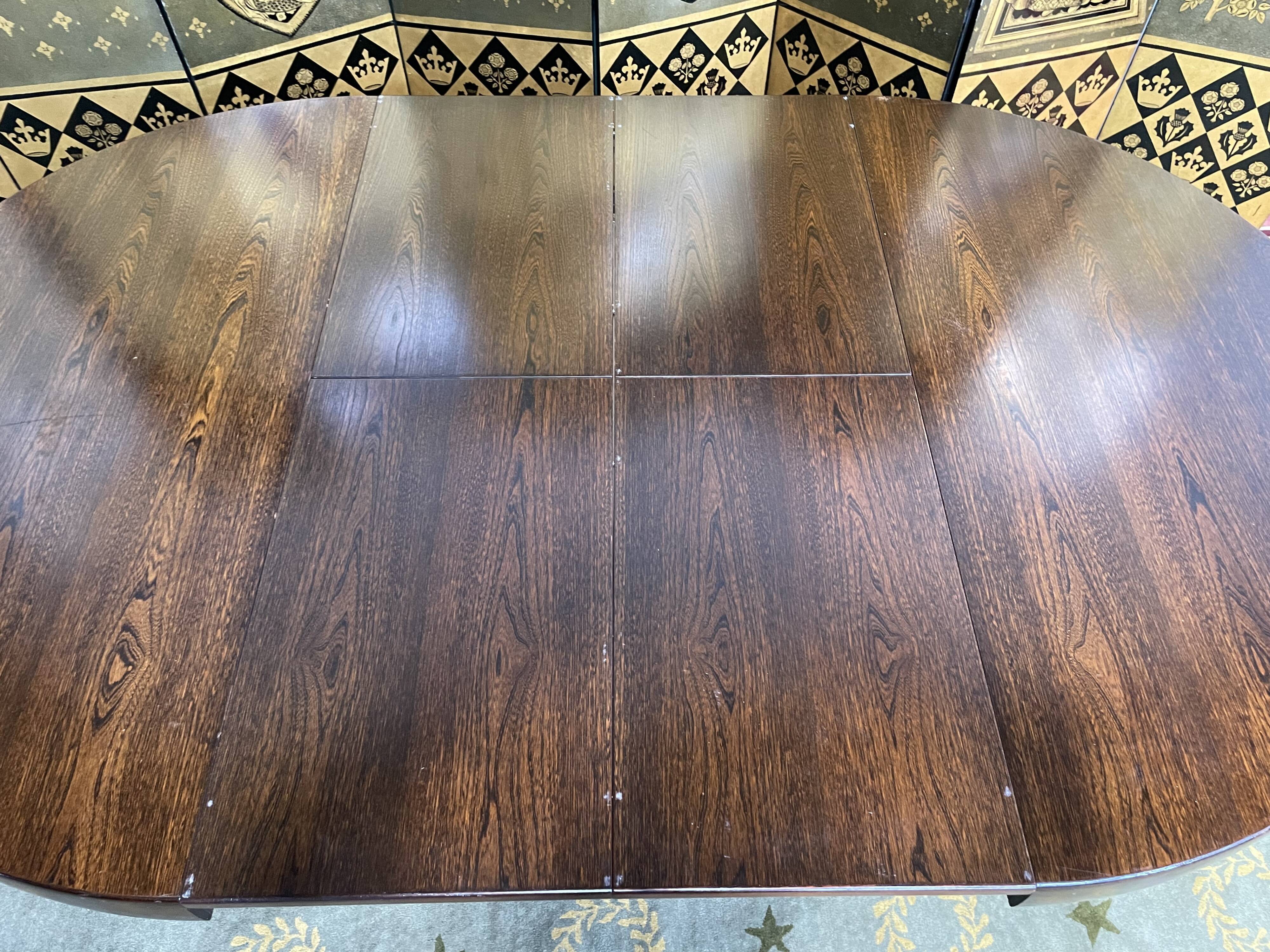 Baumann 1970 round table with integrated extensions