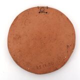 Round ceramic wall mask inspired by Africa, 1980s.