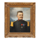 Antique portrait painting of a decorated gentleman with icy blue eyes