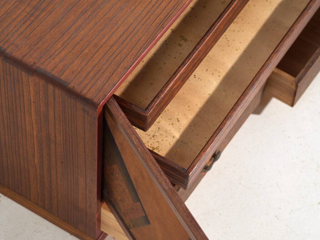 Small Japanese cabinet with sliding doors, Kabuki decoration, made of paulownia wood, early Showa period, circa 1926–1970.