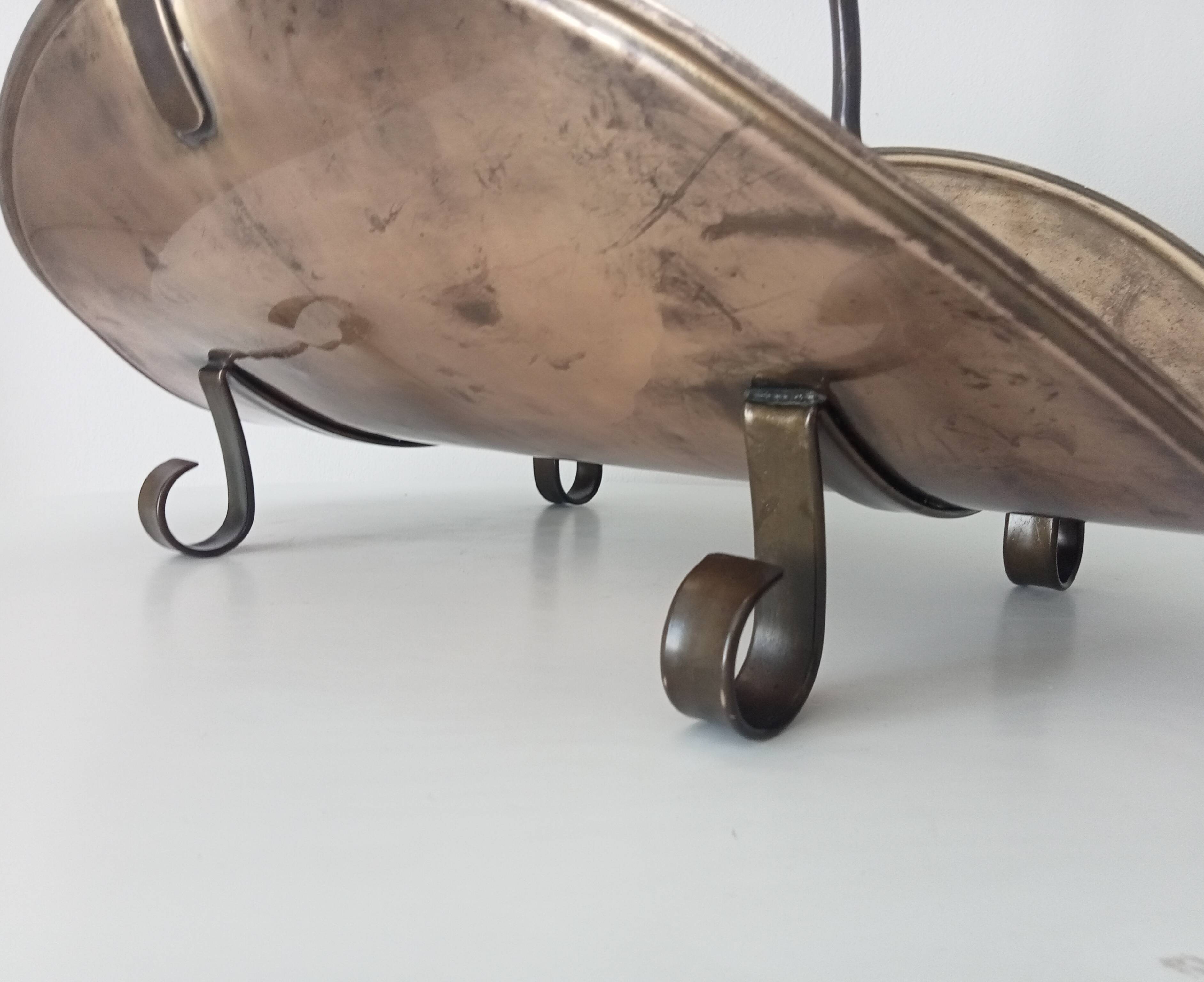 Old brass log holder