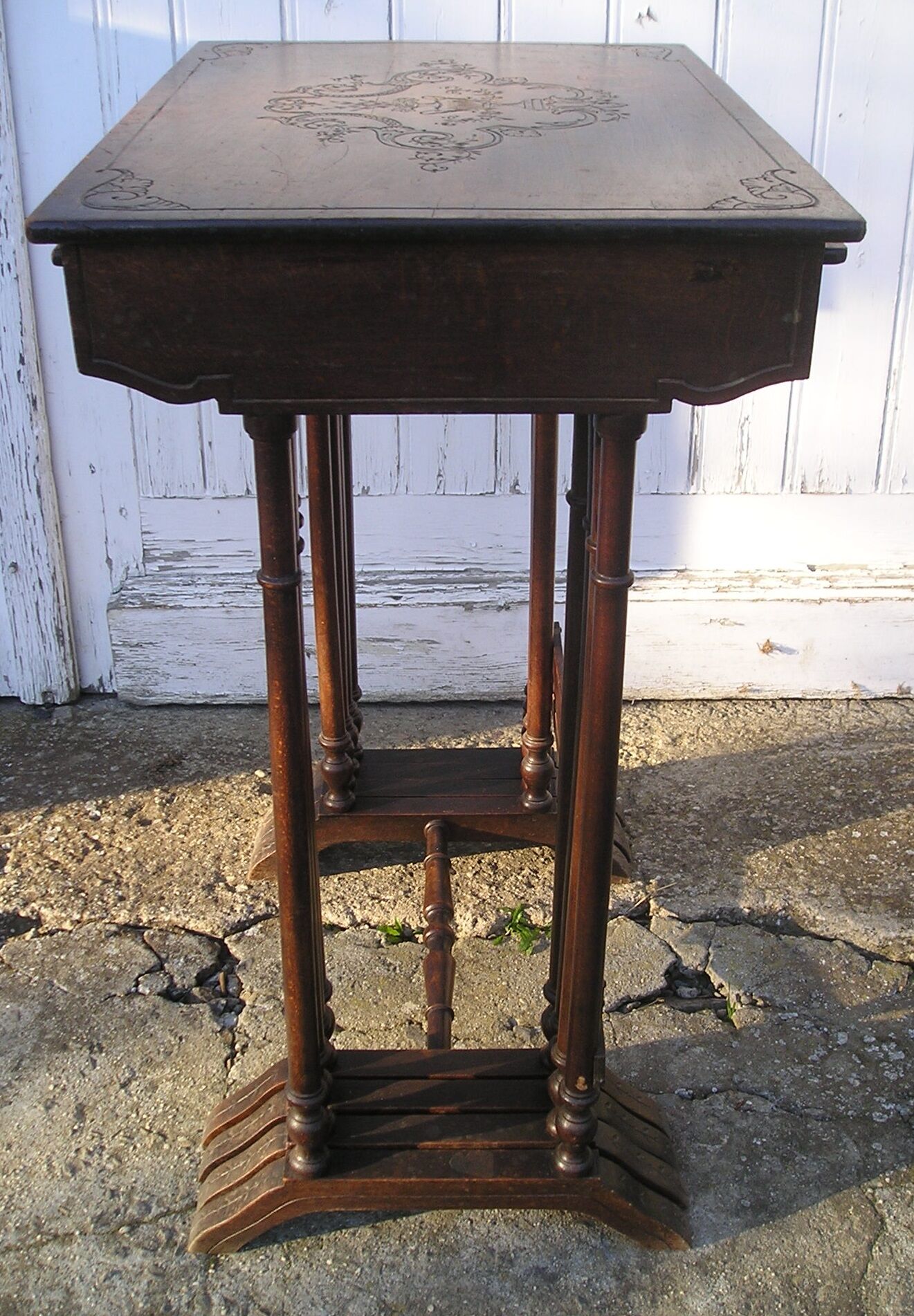 Set of 4 old tables with carved trays
