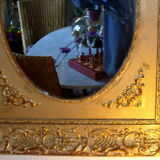Mirror in medallion, gilded Napoleon lll period