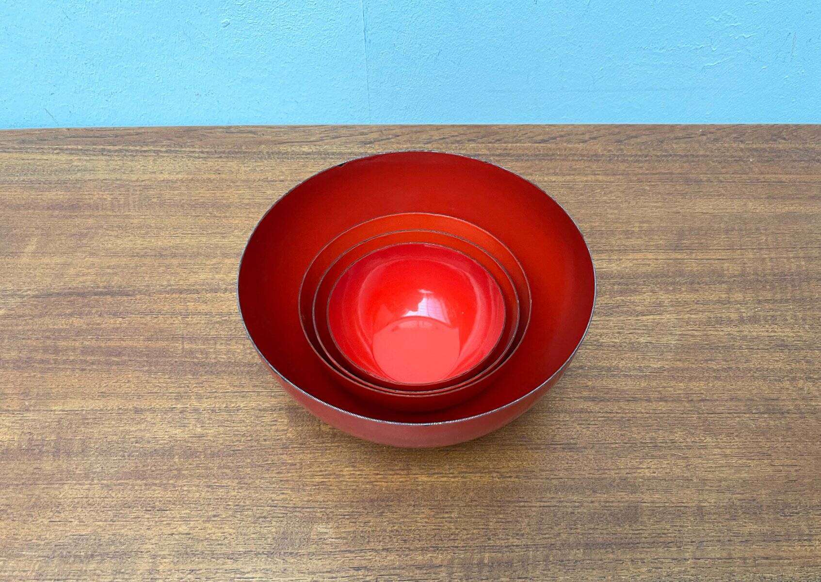 Modern mid-century red enamel bowl sets by Kaj Franck for Finel, Finland, 1960s, set of 4.