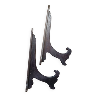 Old coat hook in blackened wood