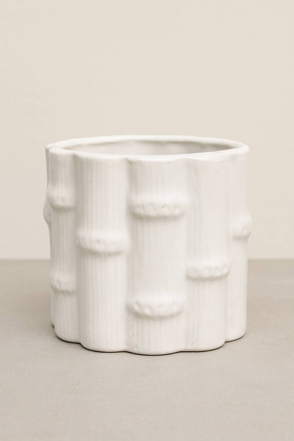 White earthenware flowerpot with bamboo decoration, signed and numbered