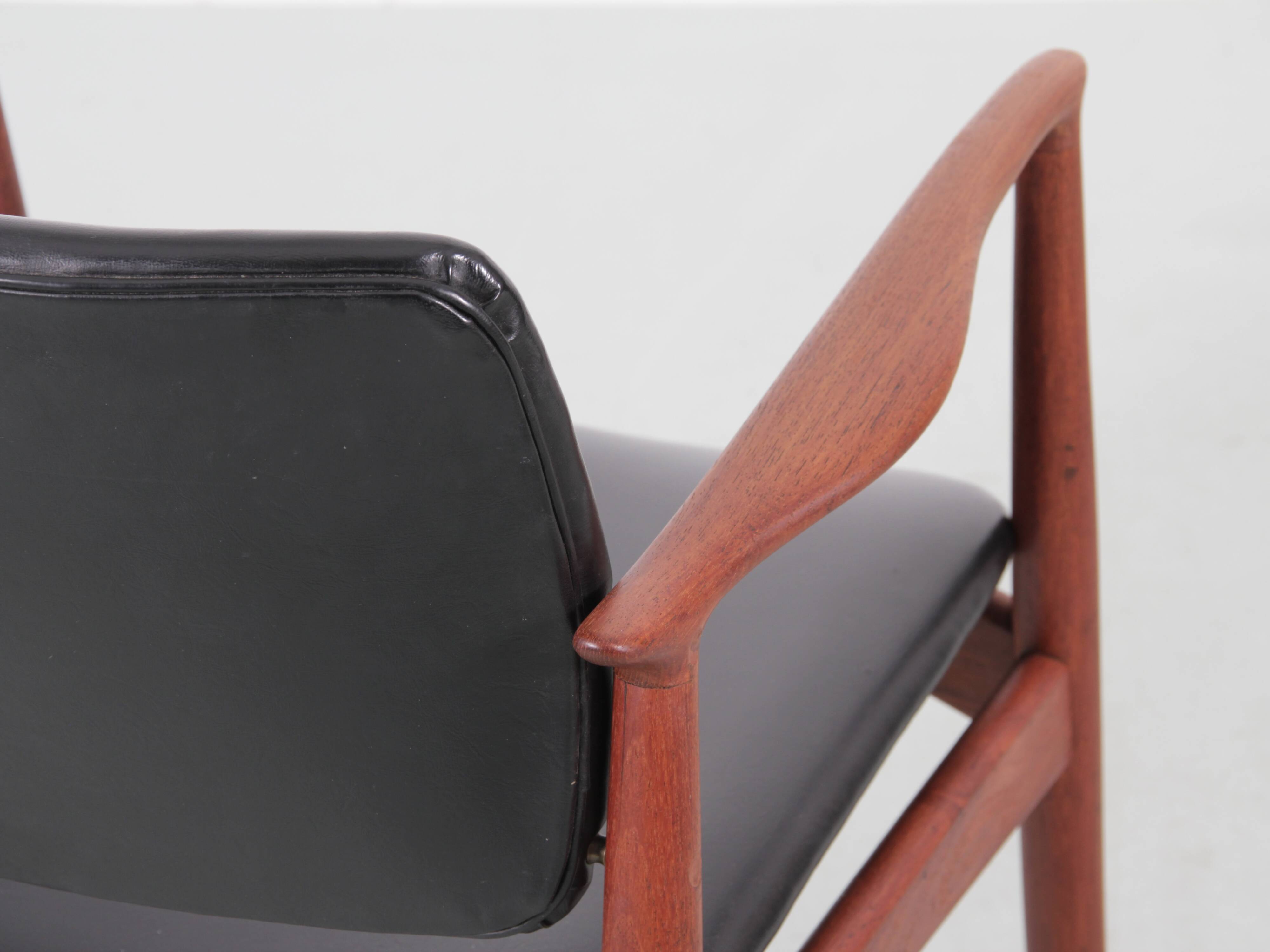 Pair of Scandinavian teak armchairs, model 66