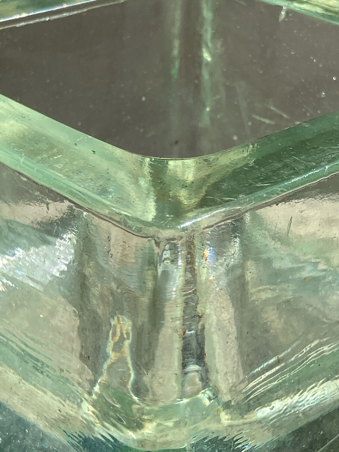 Empty pocket 70s molded glass