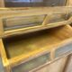 Large antique haberdashery cabinet with glass doors.