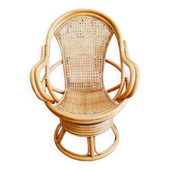 Rattan and swivel cane armchair