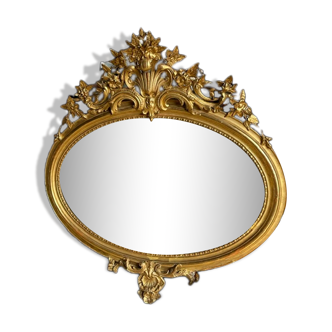 Miroir ovale Louis XV bois doré