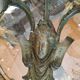 Bronze wall light patinated woman's head