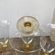 7 glasses with crystal stemmed yellow feet / cups