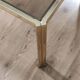 Table basse laiton plateau verre fumé