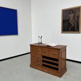 Two-sided paneled counter, bottle storage