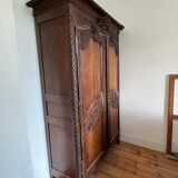 Beautiful and ancient Norman wedding wardrobe, richly carved