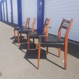 Scandinavian chairs in teak and black skaï.