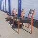 Scandinavian chairs in teak and black skaï.