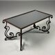 Wrought iron coffee table with mirror glass