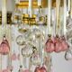 Chandelier pampilles, white and pink drops in clusters.