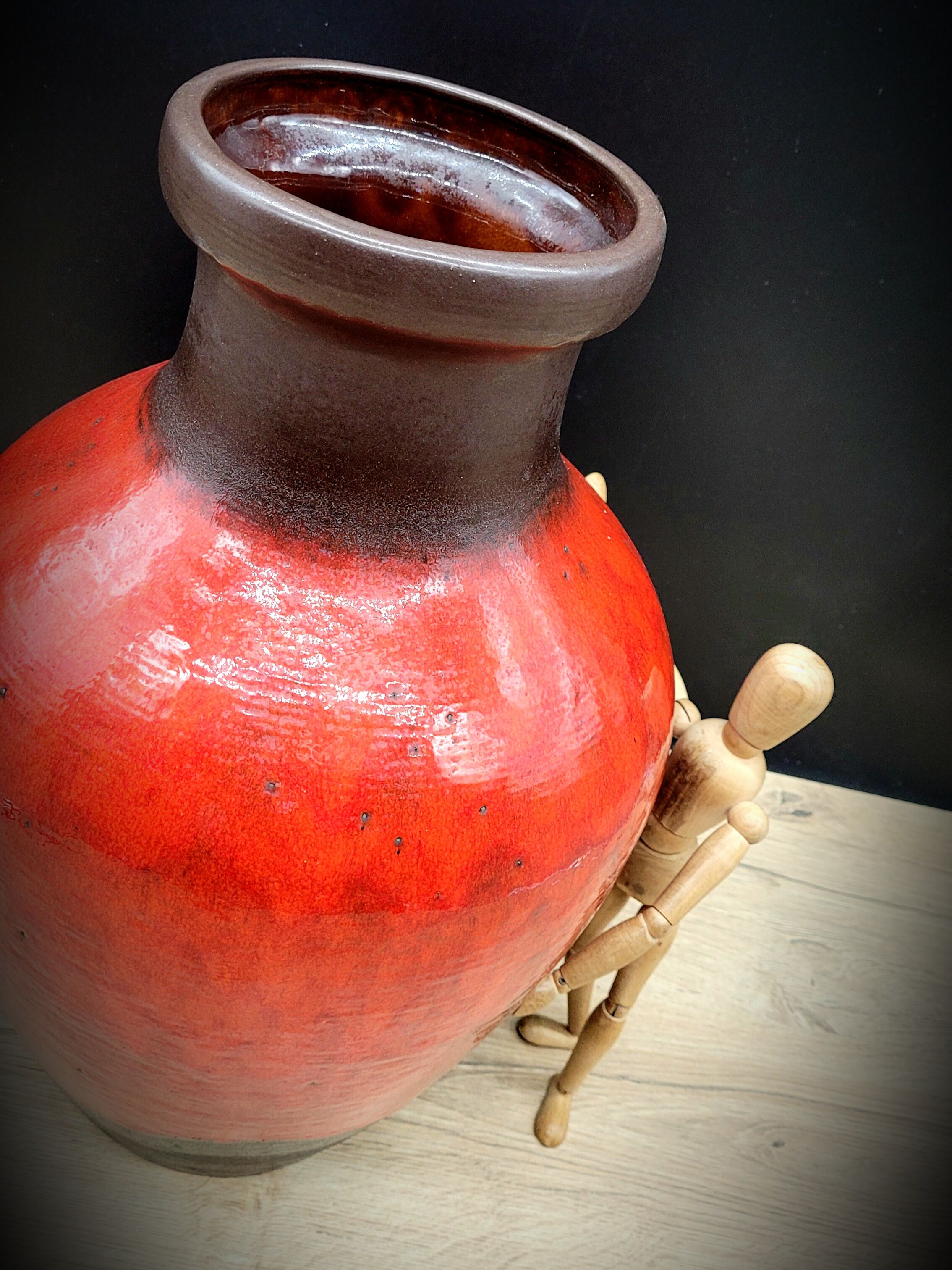 Red ceramic vase