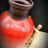 Red ceramic vase