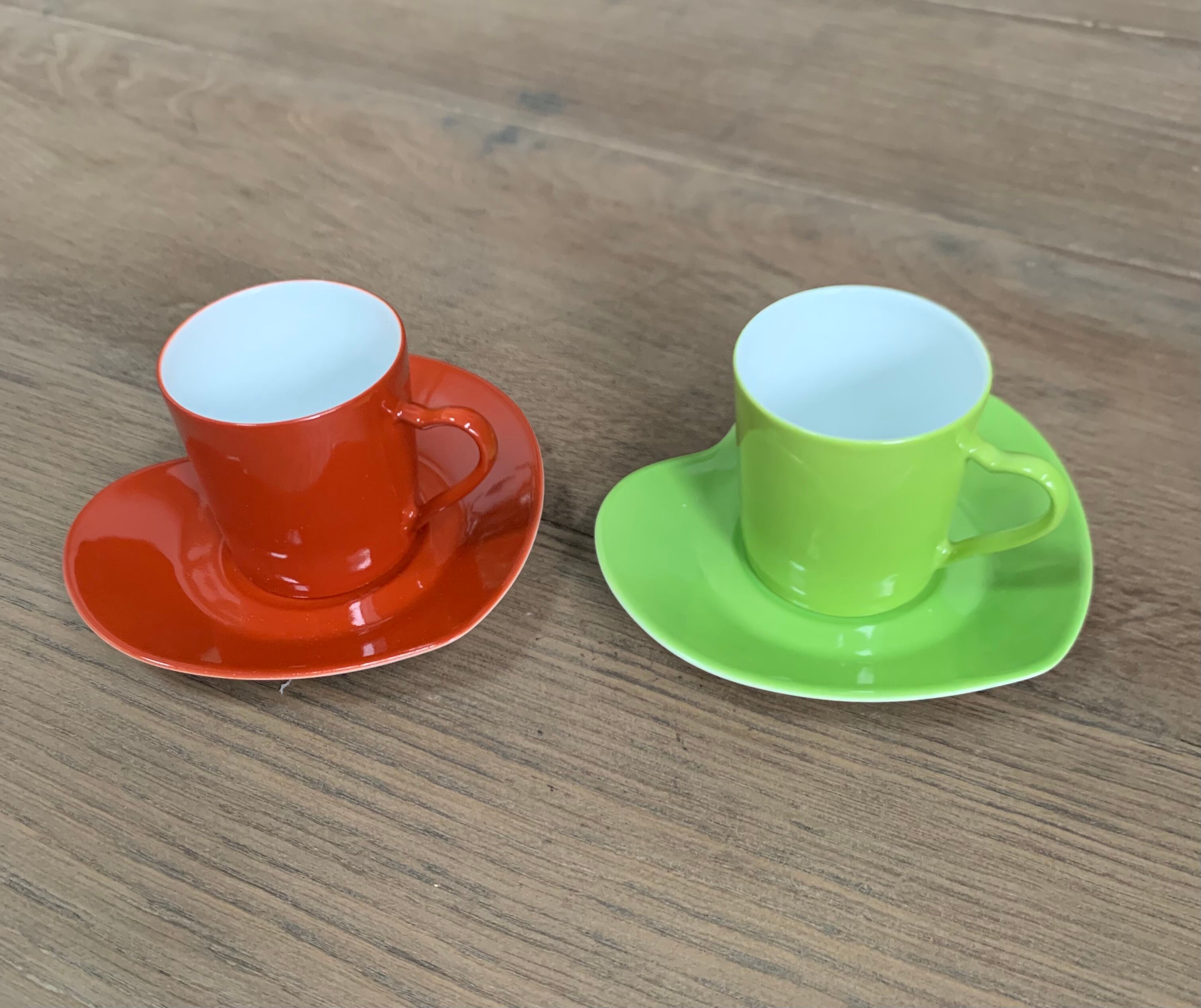 Two cups and saucers in porcelaine Yves Saint Laurent