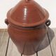 Large glazed terracotta jar, cognac colour with its lid.