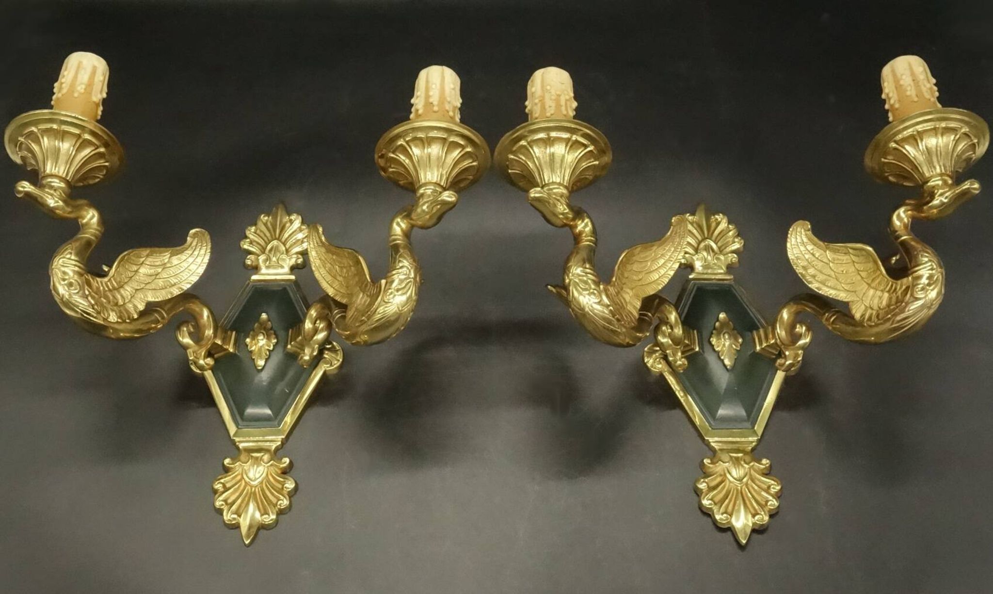 Pair of Empire style wall sconces with swans by Petitot - bronze & green patina