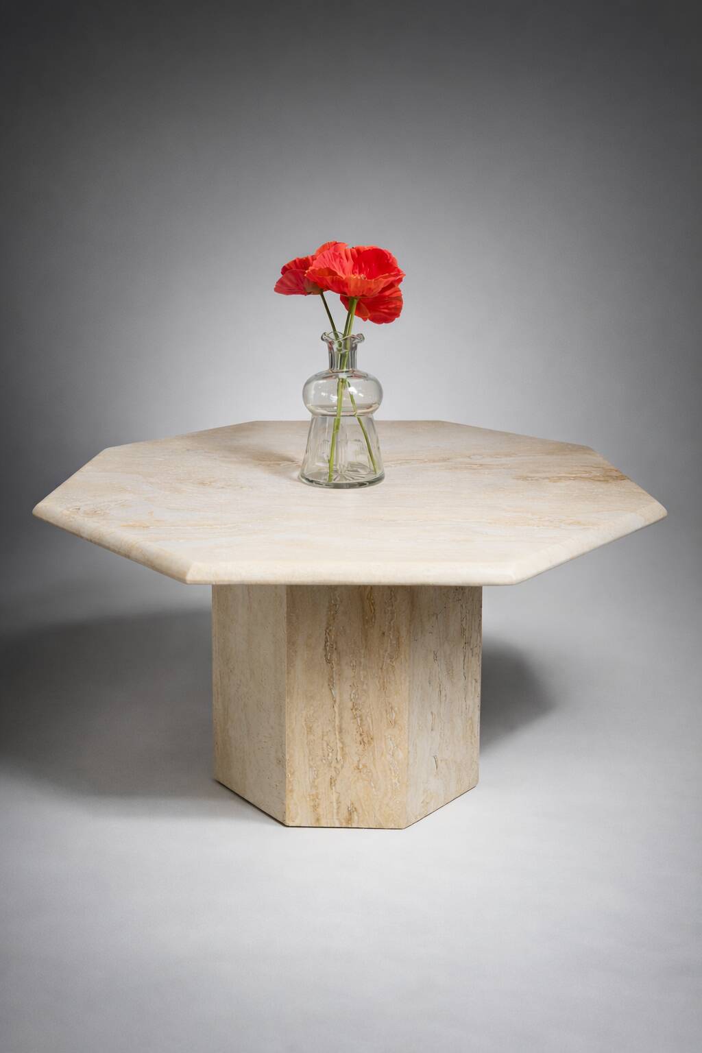 Postmodern octagonal coffee table in Italian travertine, 1970.