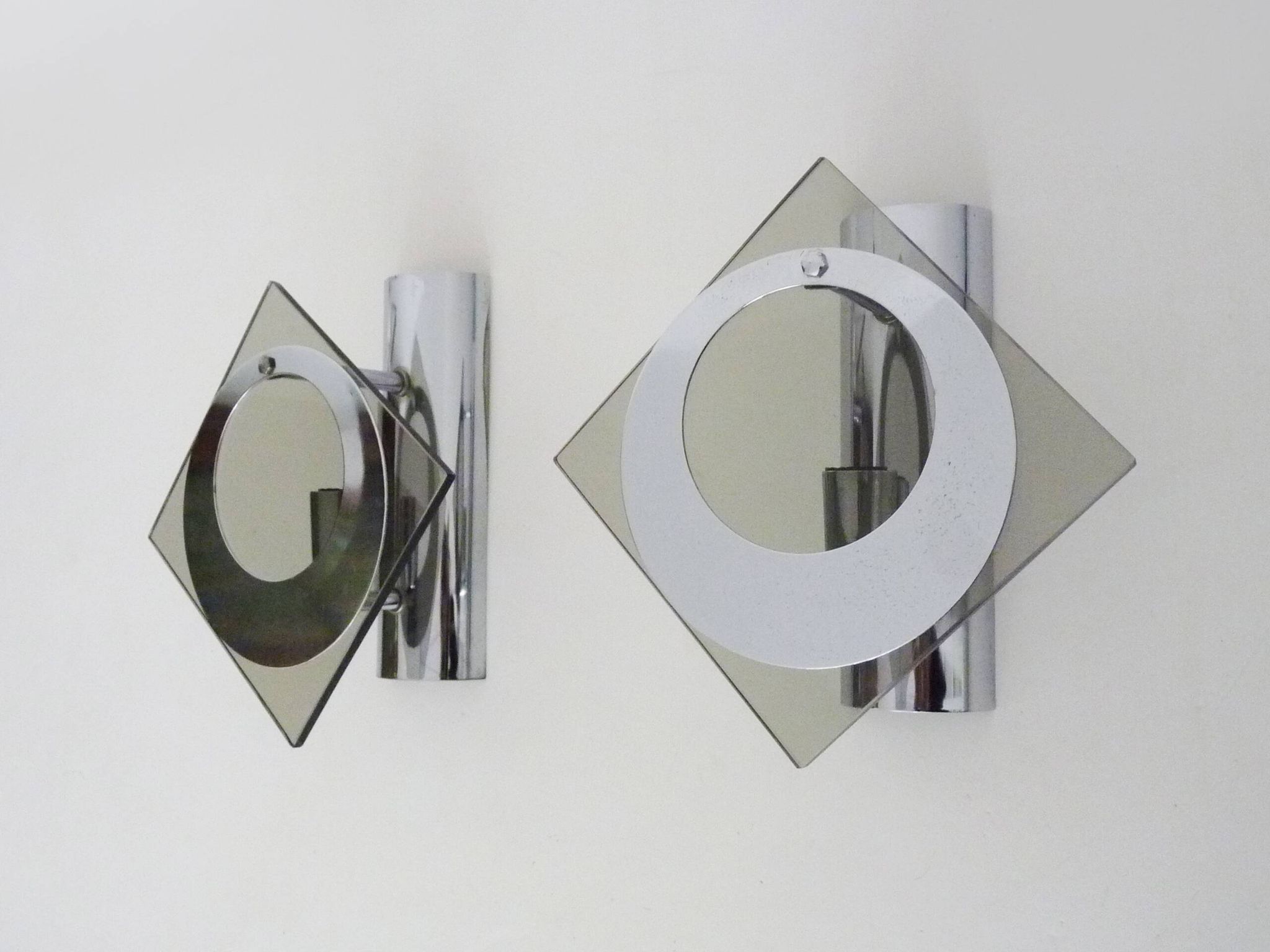Pair of chrome metal and glass wall sconces, VECA Fontana Arte style.