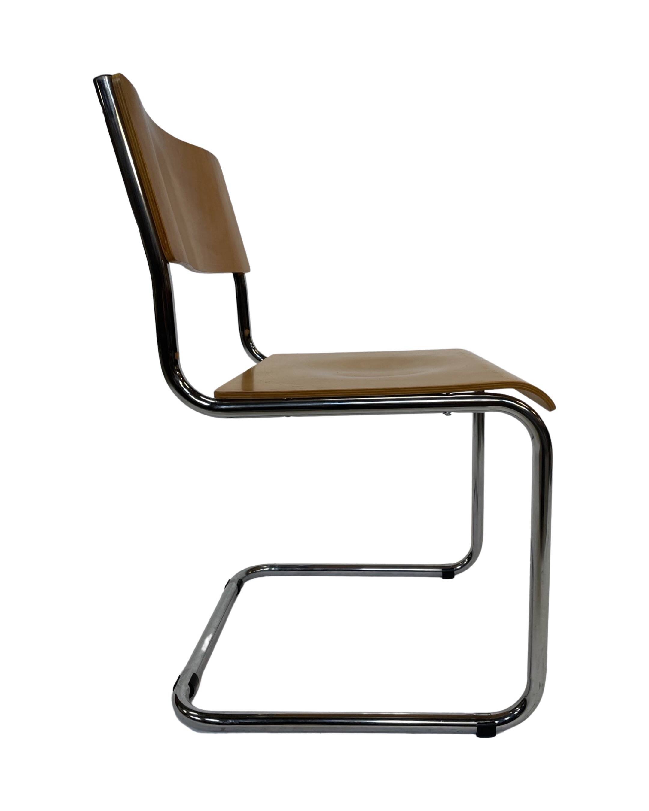 Set of four vintage dining room chairs, wood and chrome,  1970s