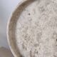 Small round tray in travertine