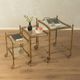 Set of 3 vintage Hollywood Regency nesting tables with brass frame and glass tops (1960s)